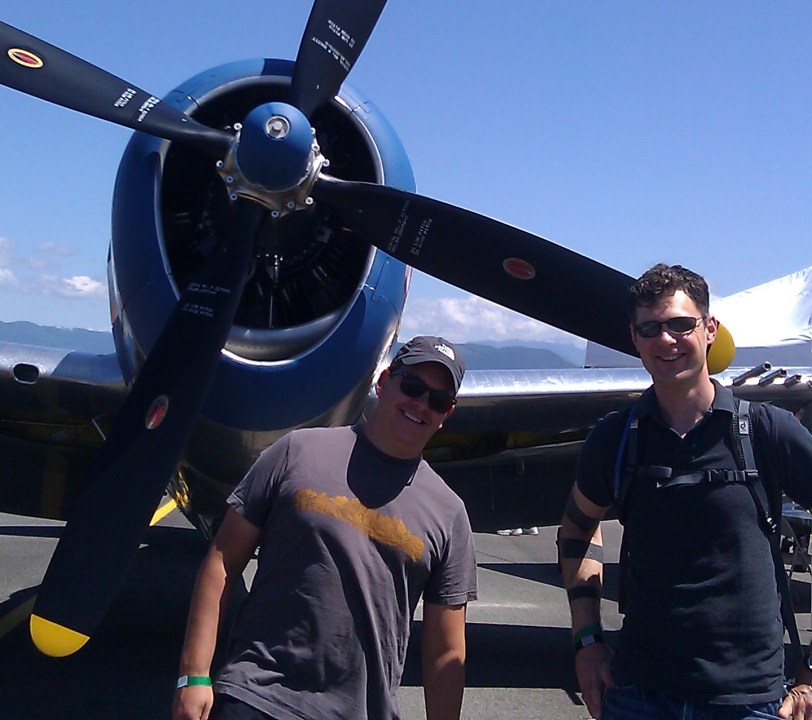 william and chad by a plane