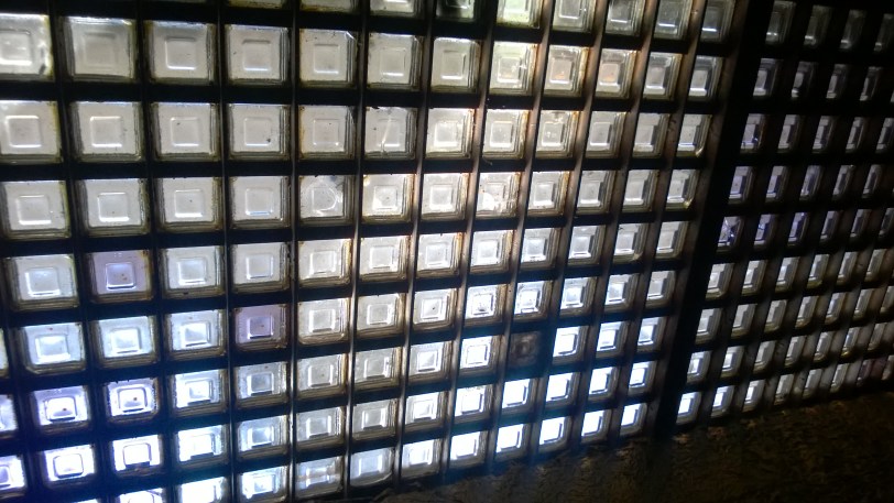 The glass ceiling of Can-Can provides a view under the sidewalk of Pike Market